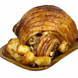 Свински бут с картофи на фурна