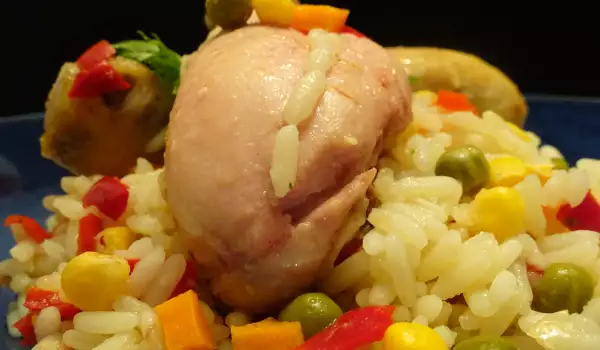 Печени пилешки бутчета и пилаф със зеленчуци