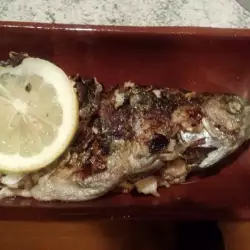 Печена риба с лимони