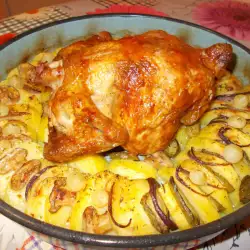 Печено пиле, обгърнато от картофки, арпаджик и още нещо