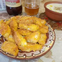 Панирани пилешки филенца със спаначен сос