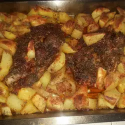 Задушени телешки пържоли с картофи на фурна