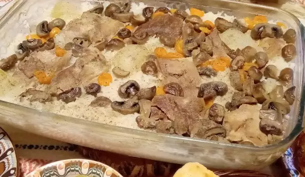 Свински джолан с ориз и гъби на фурна