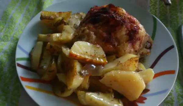Картофи на фурна с пилешки горни бутчета
