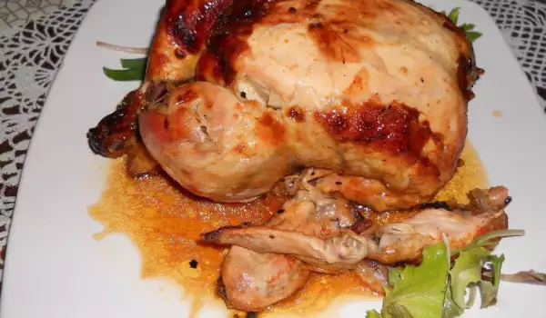 Печено пиле в плик със сос