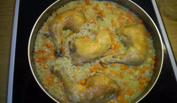Пилешки бутчета с ориз и моркови на фурна