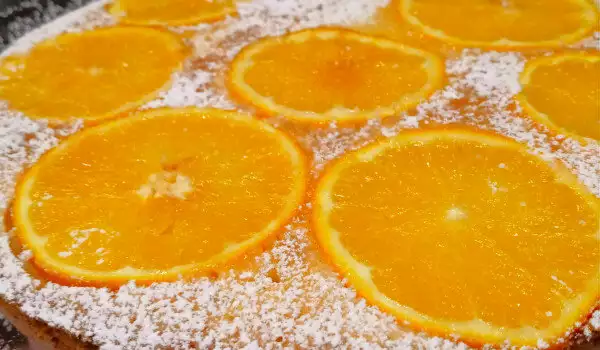 Сочен портокалов сладкиш с прясно мляко