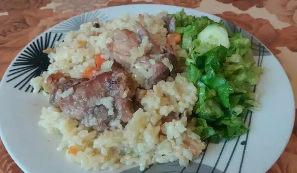 Запечено свинско месо с ориз и зеленчуци