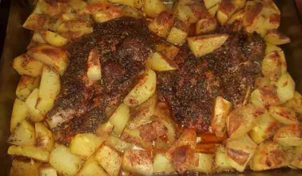 Задушени телешки пържоли с картофи на фурна