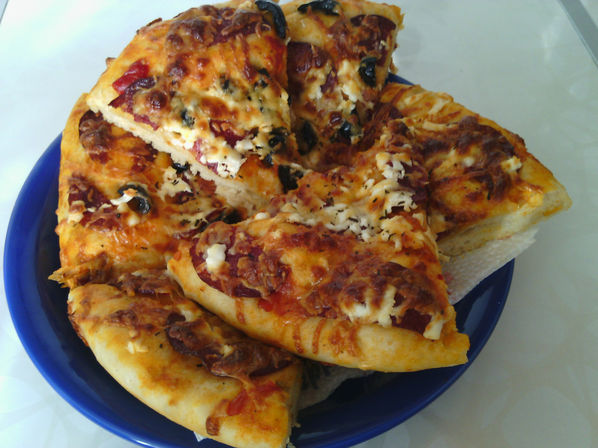 Ароматна пица с чудна плънка вкусно предложение за цялото