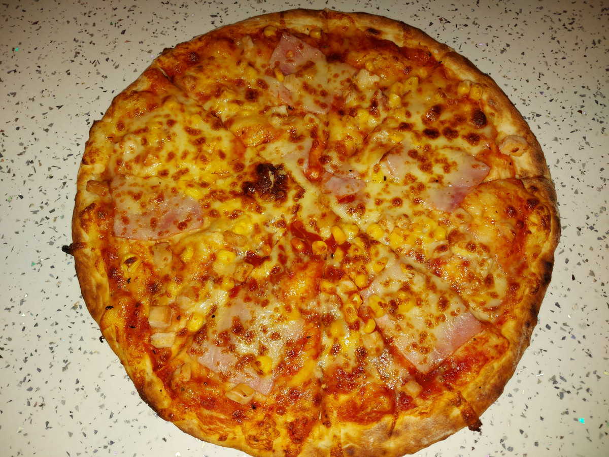Домашна пица Парадизо, която ще превърне кухнята ви в най-посещавания